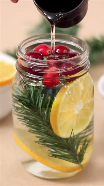 velas navideñas con agua y aceite